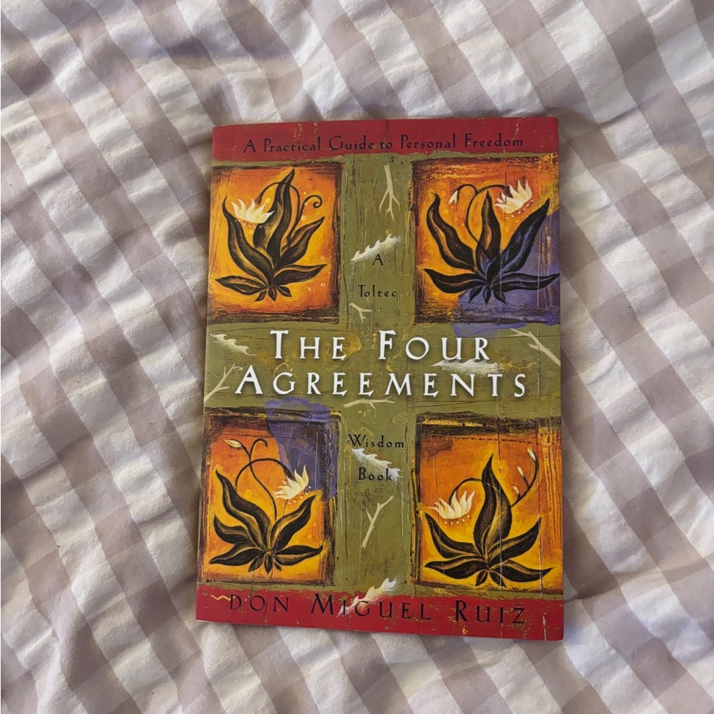 The Four Agreements book
Don Miguel Ruiz